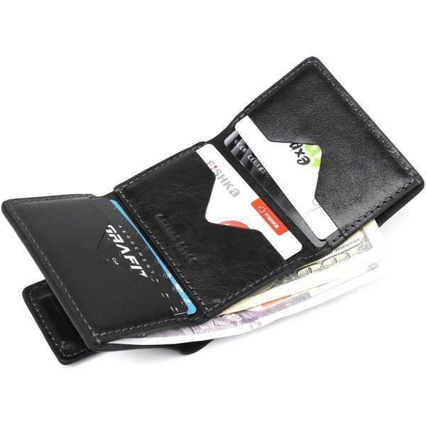 Суворе портмоне унісекс з гладкої шкіри GRANDE PELLE 11152 Чорне b11152 фото