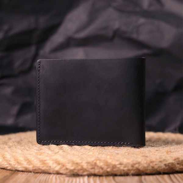 Шкіряне портмоне з вінтажної шкіри в два складення Україна GRANDE PELLE 16735 Чорний b16735 фото