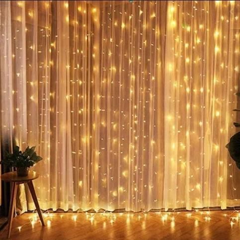Гірлянда штора Водоспад 3х2 м 400 LED (прозорий шнур з перехідником) Золоте світло L2006232 фото